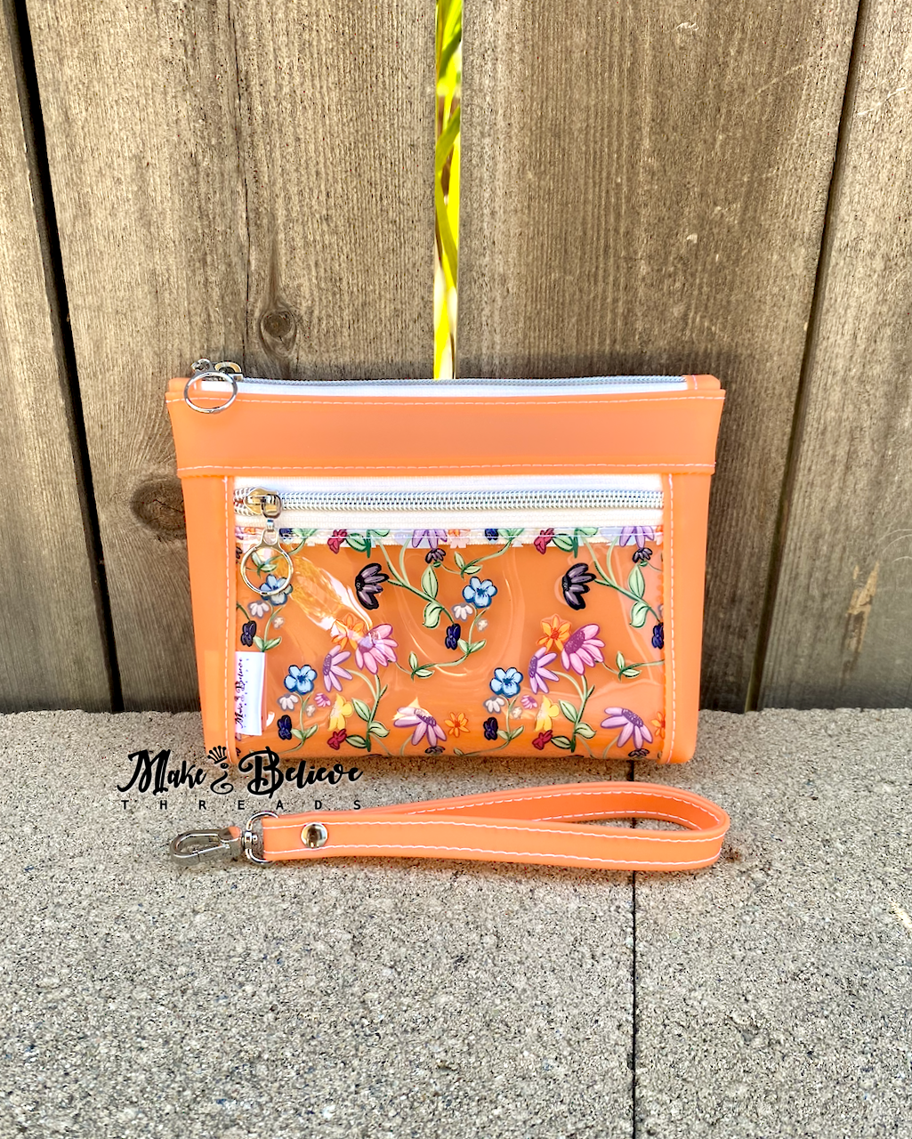 Tangerine Jelly with Clear Flowers Pouch with Wristlet Strap