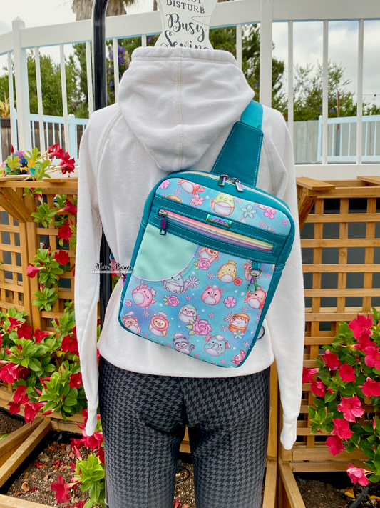 Teal Squishimals Midsize Sling Bag