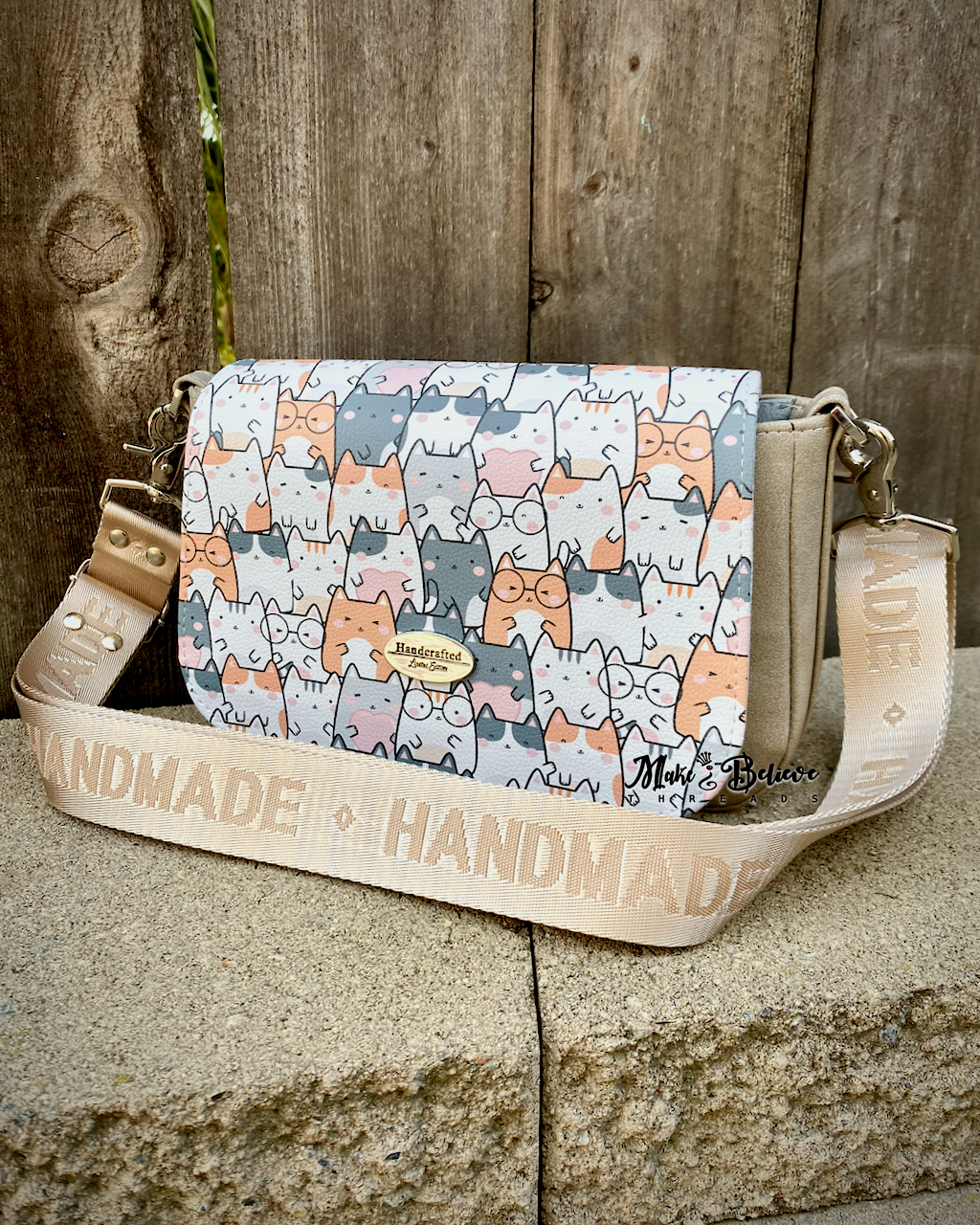 Beige Smitten Kittens Crossbody Saddle Bag