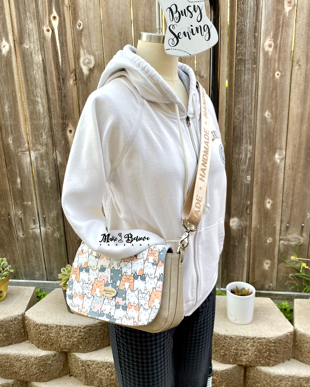 Beige Smitten Kittens Crossbody Saddle Bag