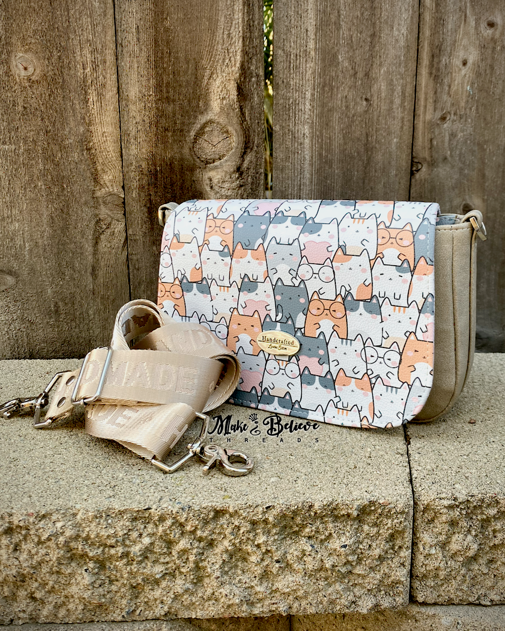 Beige Smitten Kittens Crossbody Saddle Bag