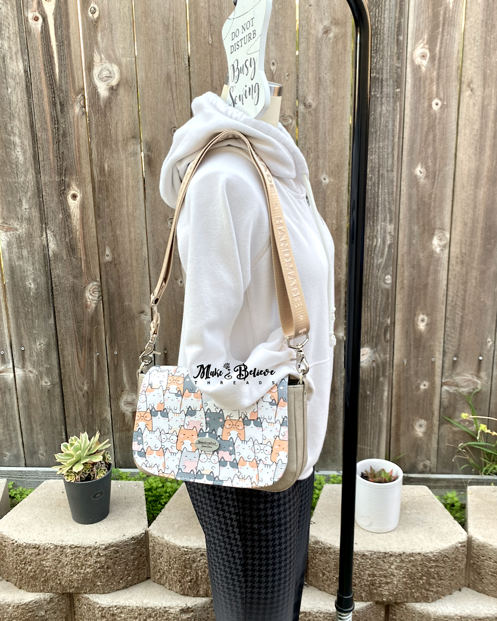 Beige Smitten Kittens Crossbody Saddle Bag