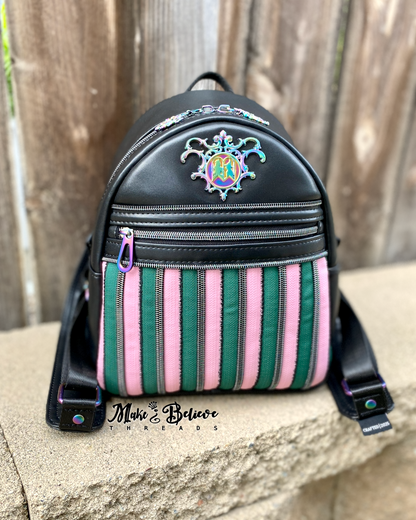 Black Wicked Backpack with Custom Green and Pink Zippered Textile