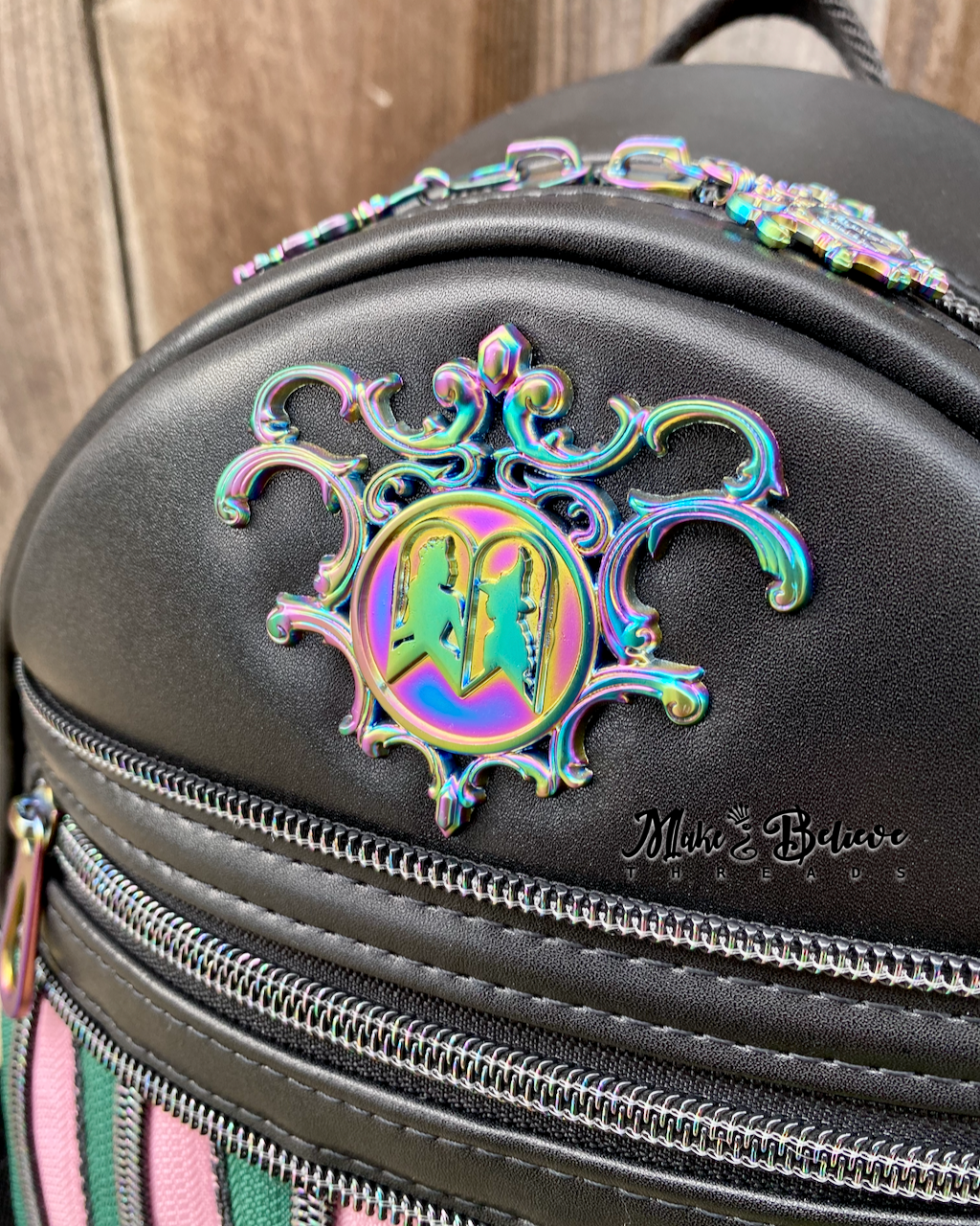 Black Wicked Backpack with Custom Green and Pink Zippered Textile