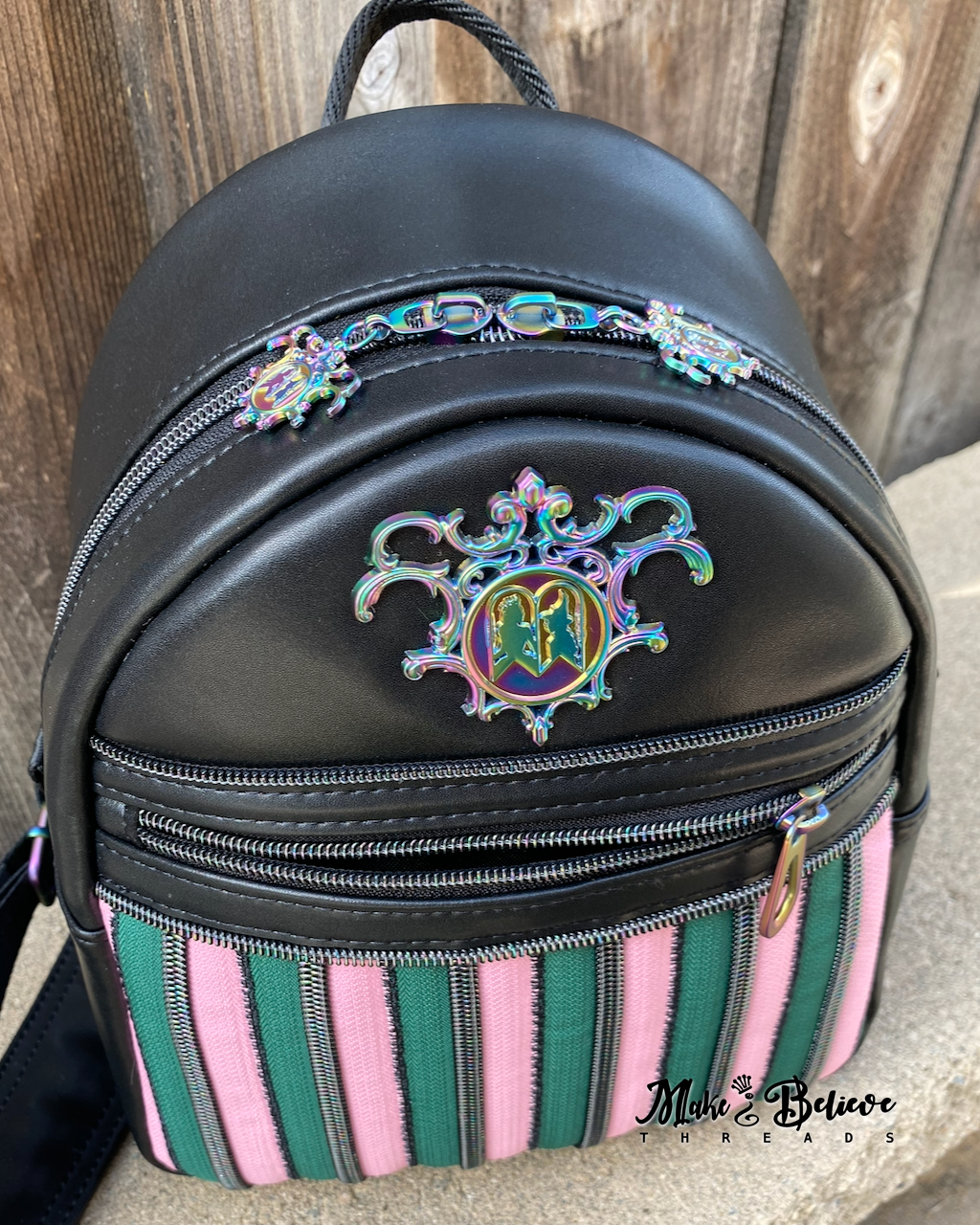 Black Wicked Backpack with Custom Green and Pink Zippered Textile