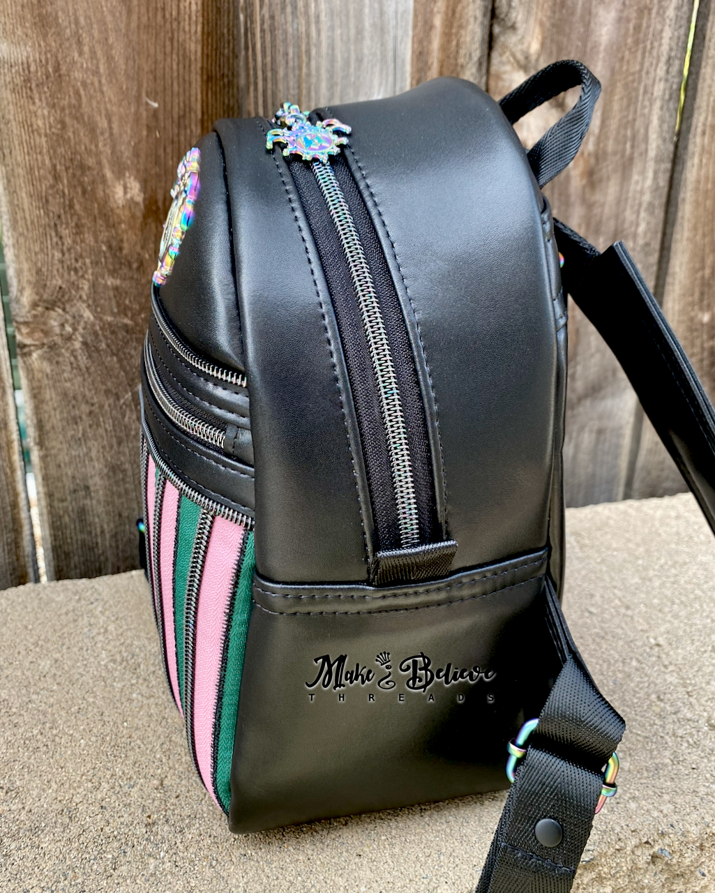 Black Wicked Backpack with Custom Green and Pink Zippered Textile