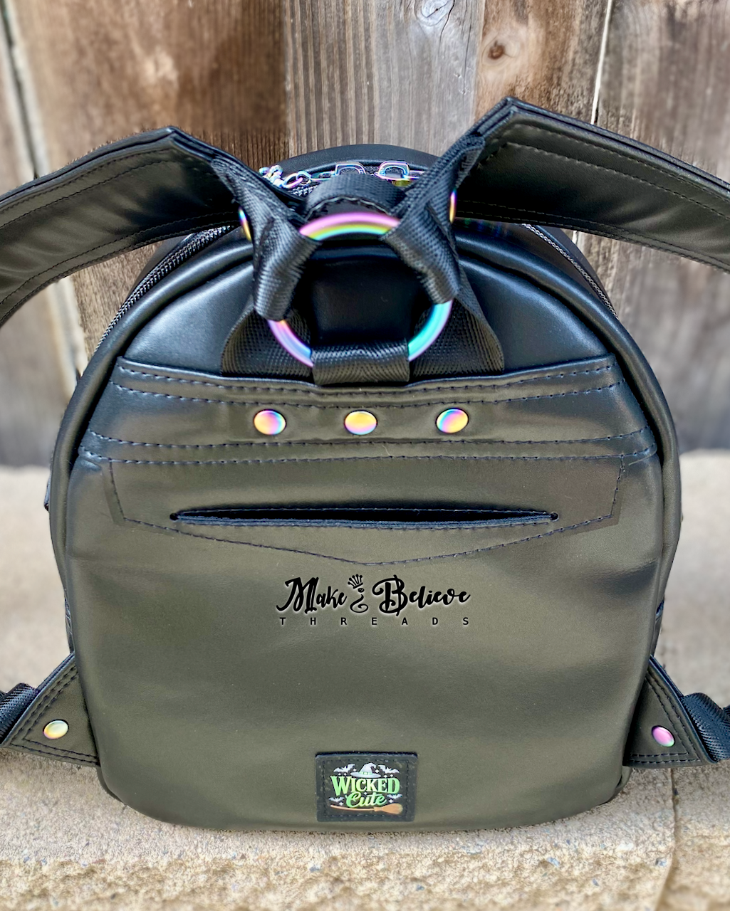 Black Wicked Backpack with Custom Green and Pink Zippered Textile