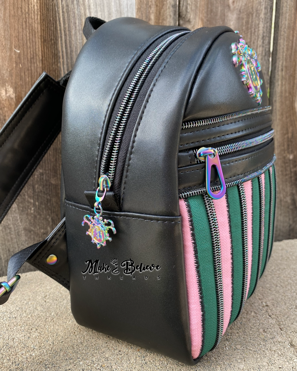 Black Wicked Backpack with Custom Green and Pink Zippered Textile