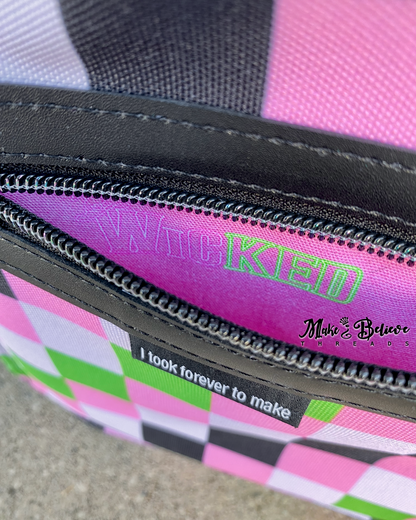 Black Wicked Backpack with Custom Green and Pink Zippered Textile