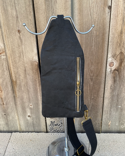 Black and Tan Tossed Witchy Books Mini Traveler Sling