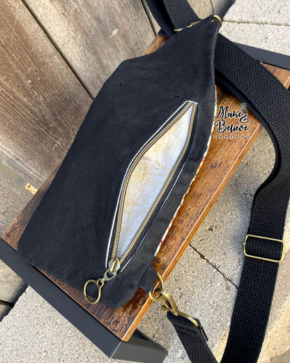 Black and Tan Tossed Witchy Books Mini Traveler Sling