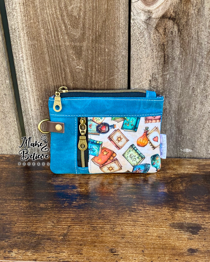 Blue Waxed Canvas Tossed Witchy Books Mini Zip Wallet