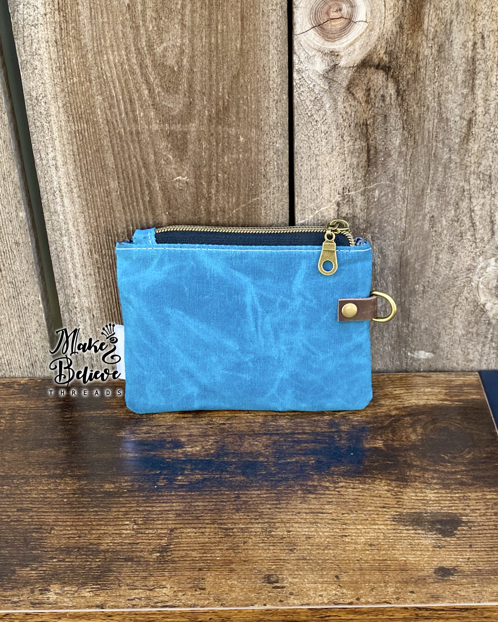 Blue Waxed Canvas Tossed Witchy Books Mini Zip Wallet