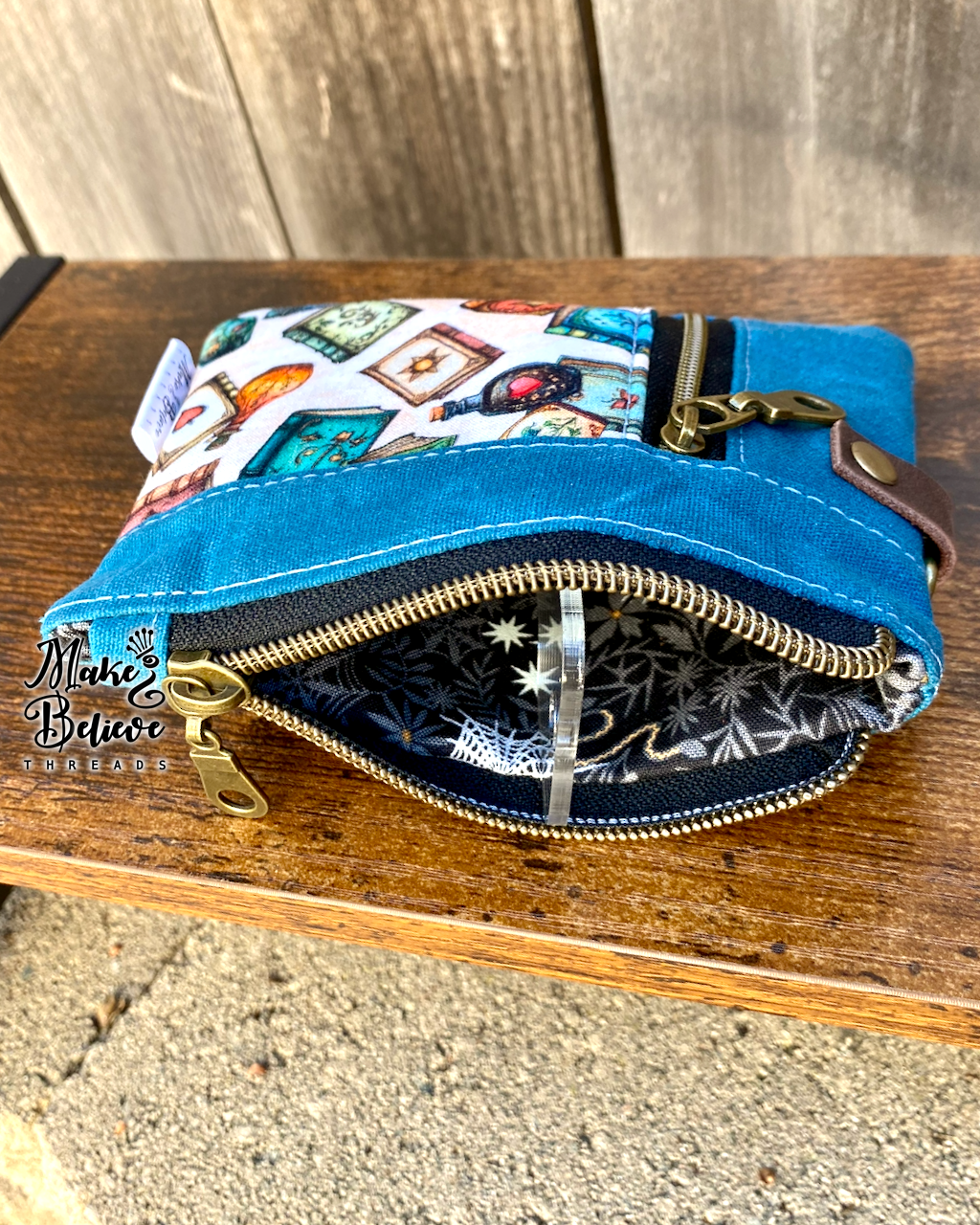 Blue Waxed Canvas Tossed Witchy Books Mini Zip Wallet