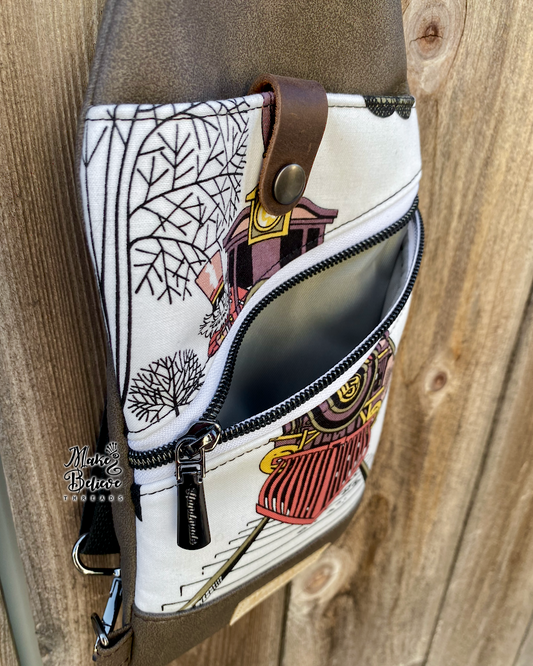 Brown AH Ghastlies Train Mini Traveler Sling
