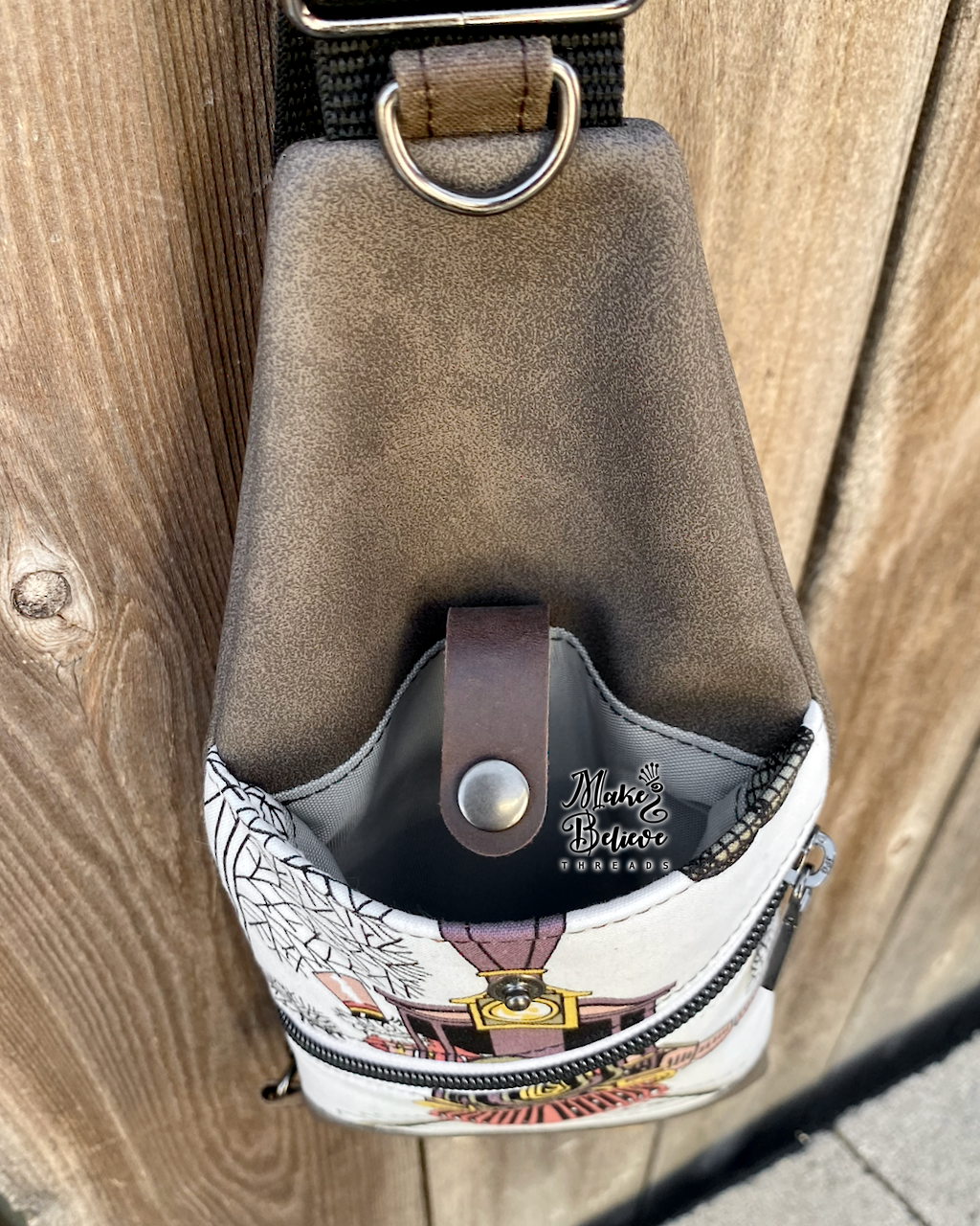 Brown AH Ghastlies Train Mini Traveler Sling