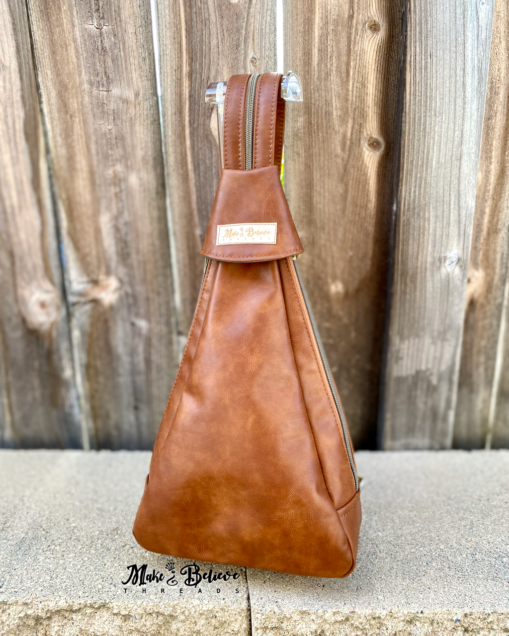 Caramel Faux Leather Conical Convertible Sling/Backpack