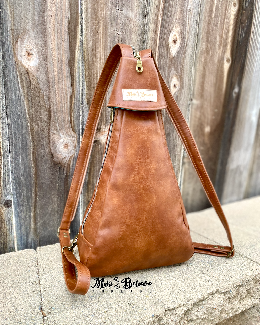 Caramel Faux Leather Conical Convertible Sling/Backpack