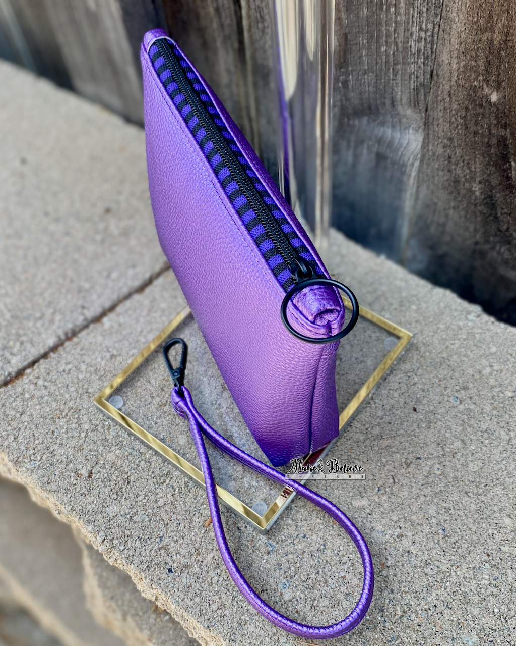 Cartoon Sea Witch Shimmering Purple Pouch with Wristlet Strap