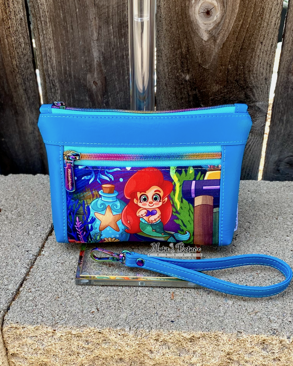 Cartoon Singing Mermaid Turquoise Pouch with Wristlet Strap