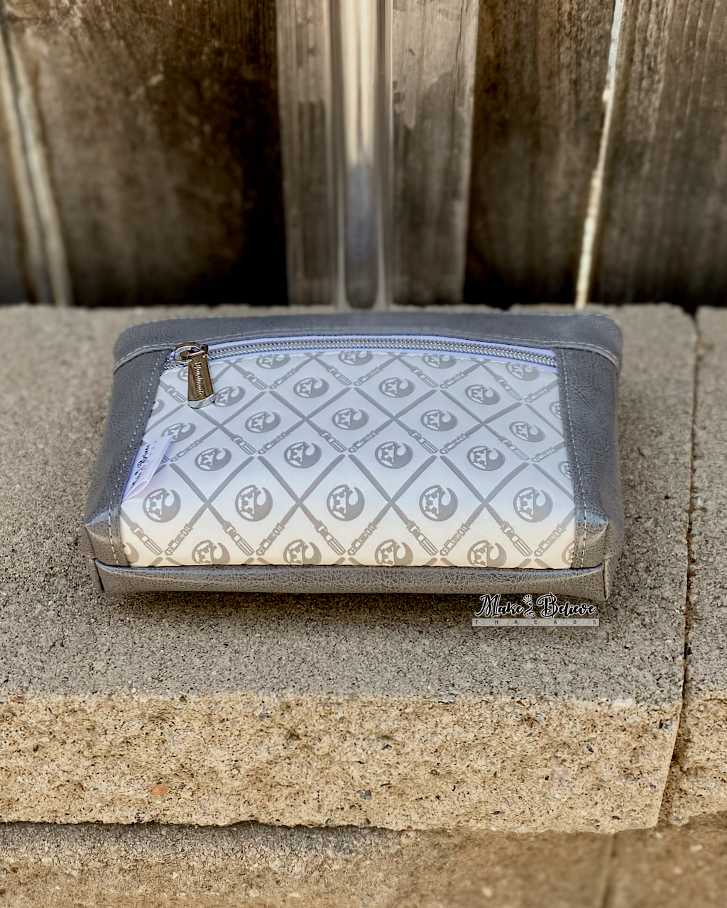Debossed Space Wars Grey and White Pouch with Wristlet Strap