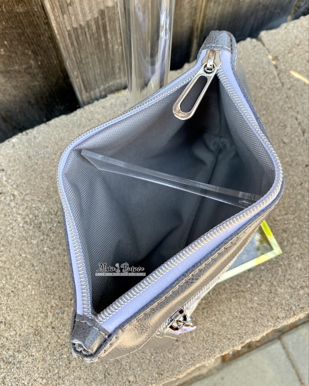 Debossed Space Wars Grey and White Pouch with Wristlet Strap