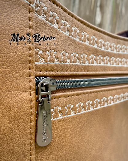 Light Brown Hobo Bag With Embroidered Cat Detailing