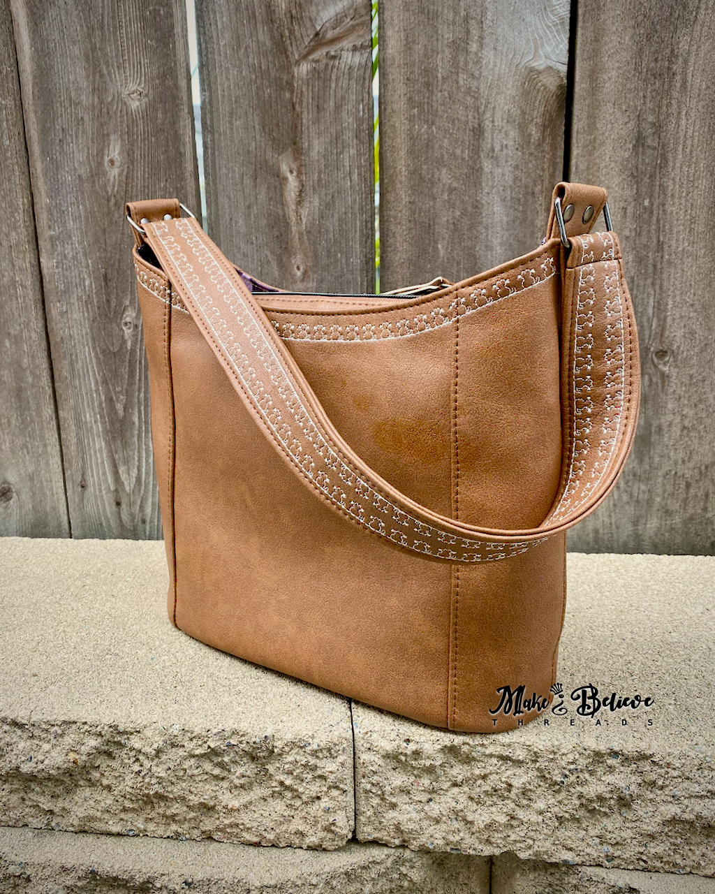 Light Brown Hobo Bag With Embroidered Cat Detailing