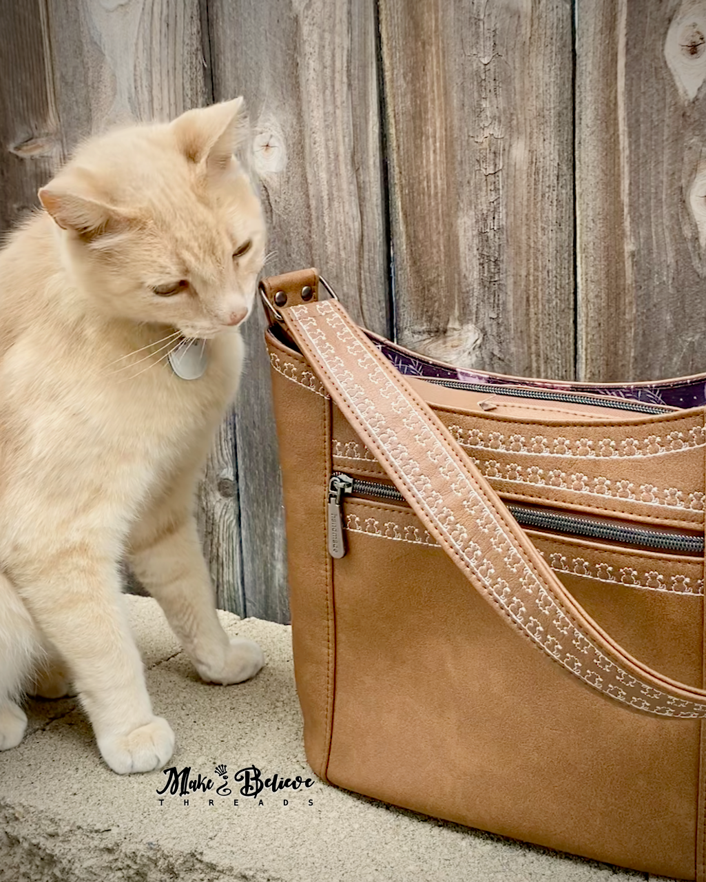 Light Brown Hobo Bag With Embroidered Cat Detailing