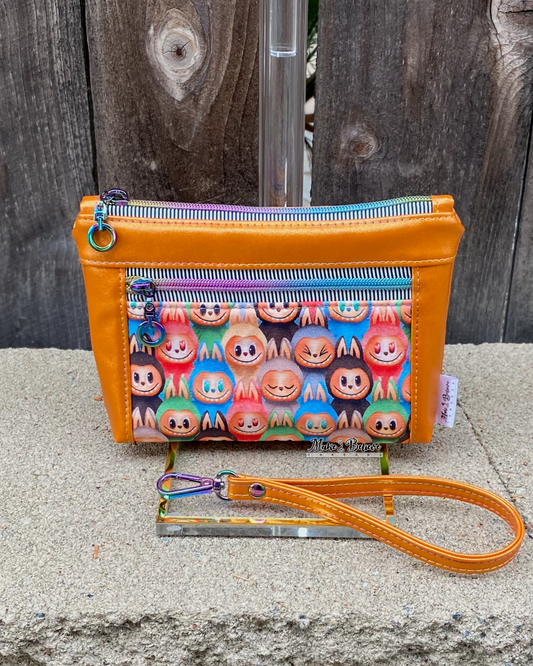 Little Monsters Orange Shimmering Pouch with Wristlet Strap