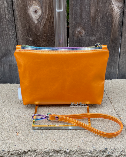 Little Monsters Orange Shimmering Pouch with Wristlet Strap