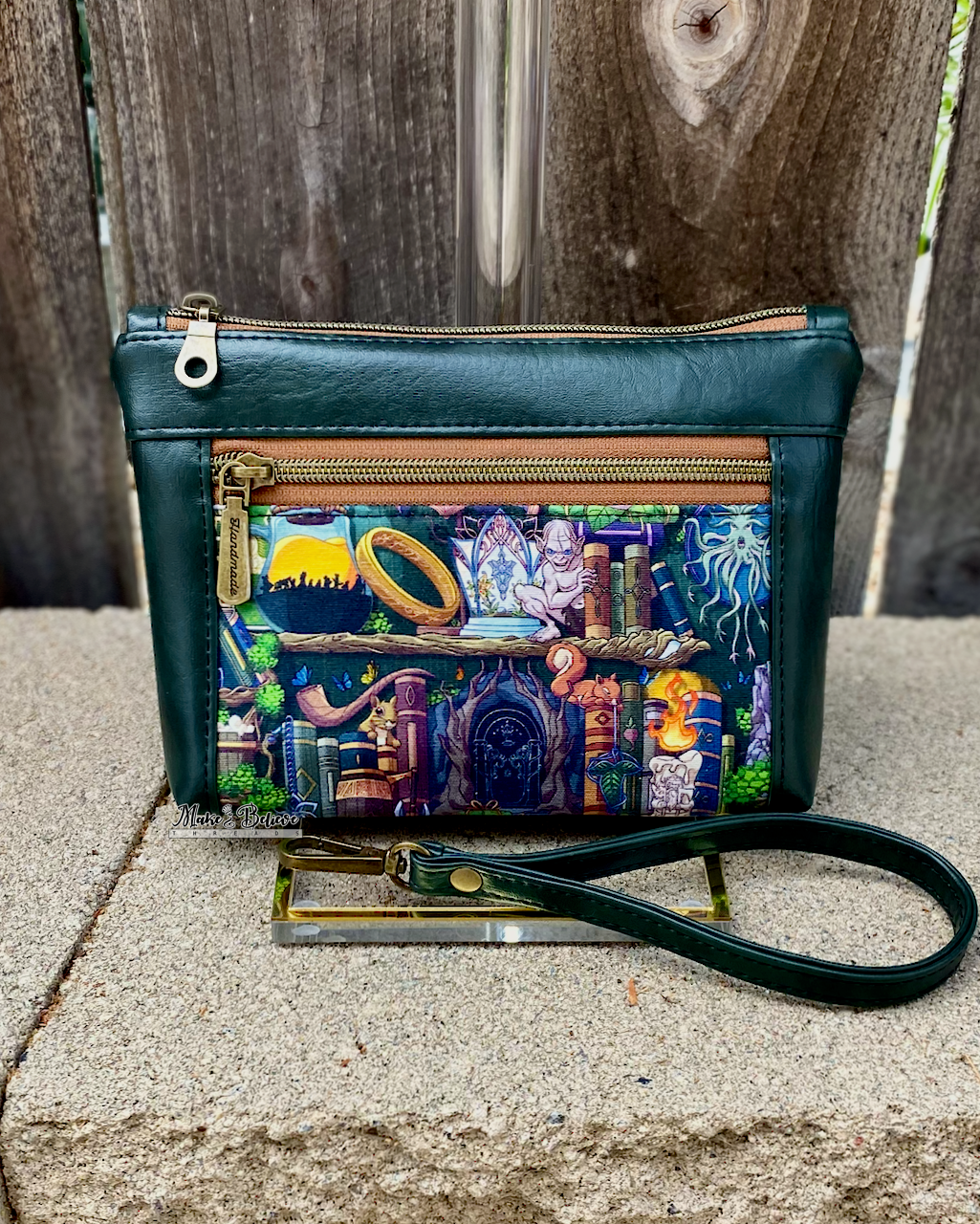 One Ring Bookshelf Dark Green Pouch with Wristlet Strap