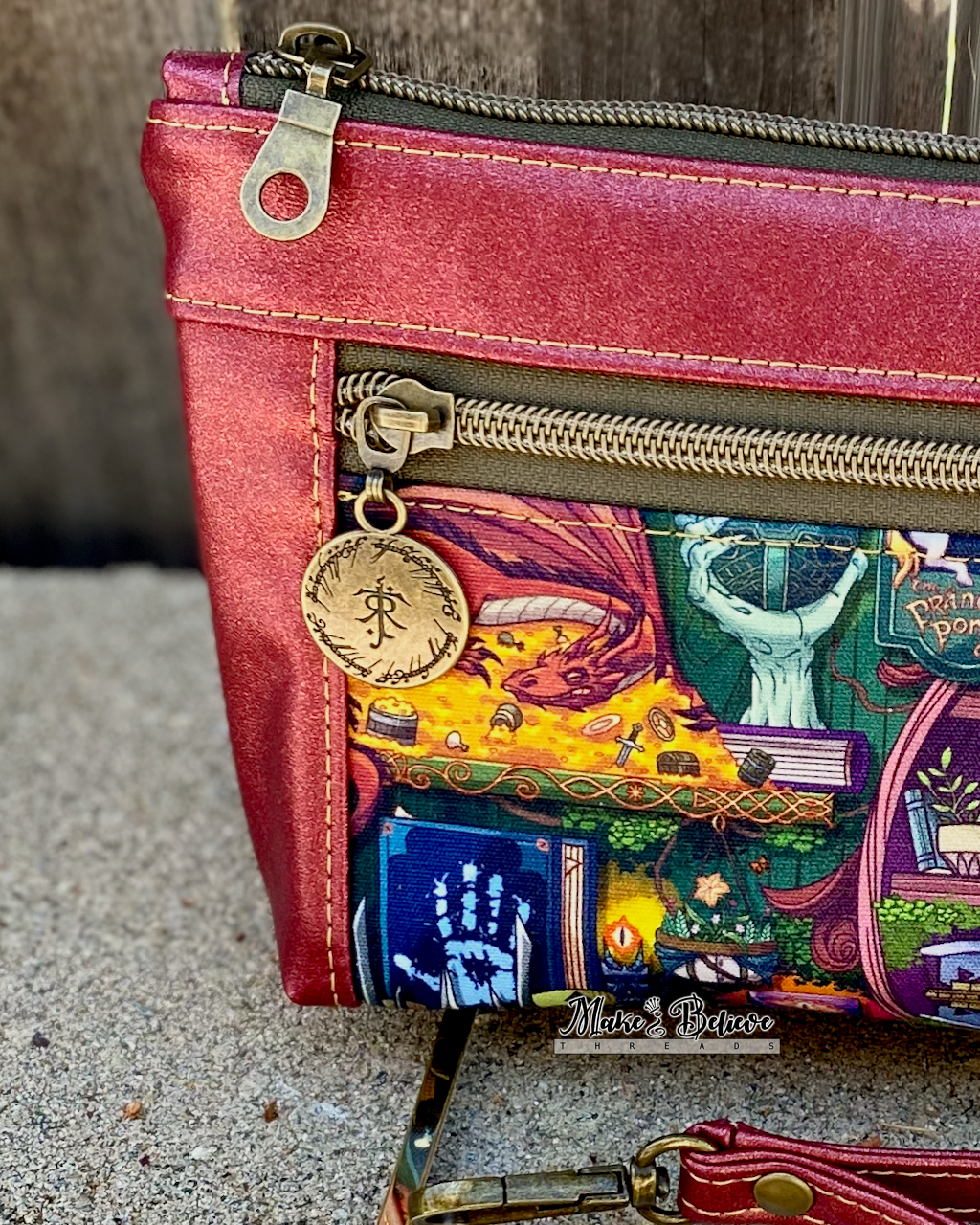 One Ring Bookshelf Shimmering Cranberry Pouch with Wristlet Strap