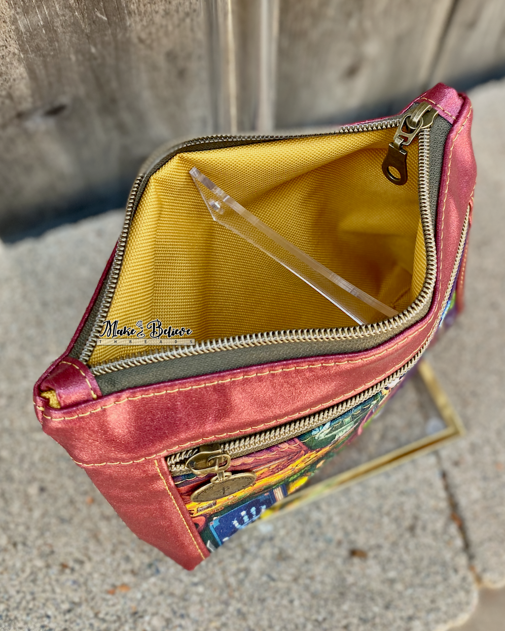 One Ring Bookshelf Shimmering Cranberry Pouch with Wristlet Strap