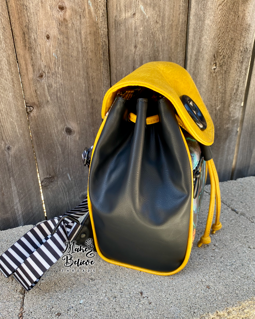 Otherworld Girl Mini Bucket Backpack with Flap