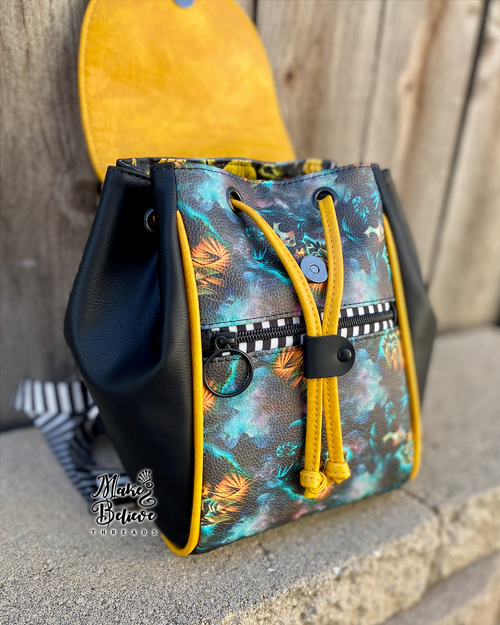 Otherworld Girl Mini Bucket Backpack with Flap