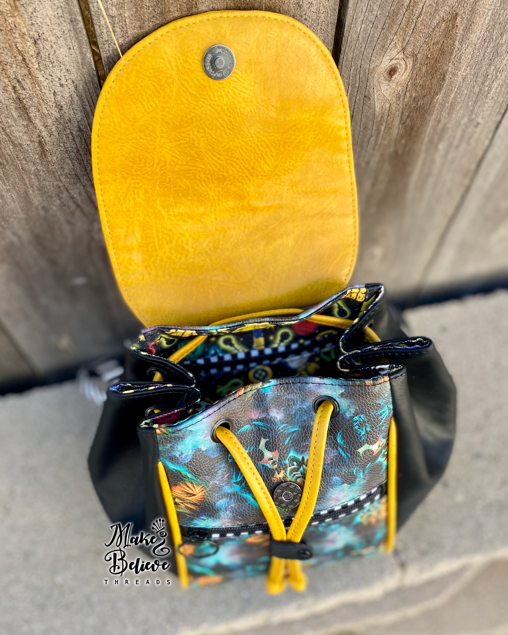 Otherworld Girl Mini Bucket Backpack with Flap