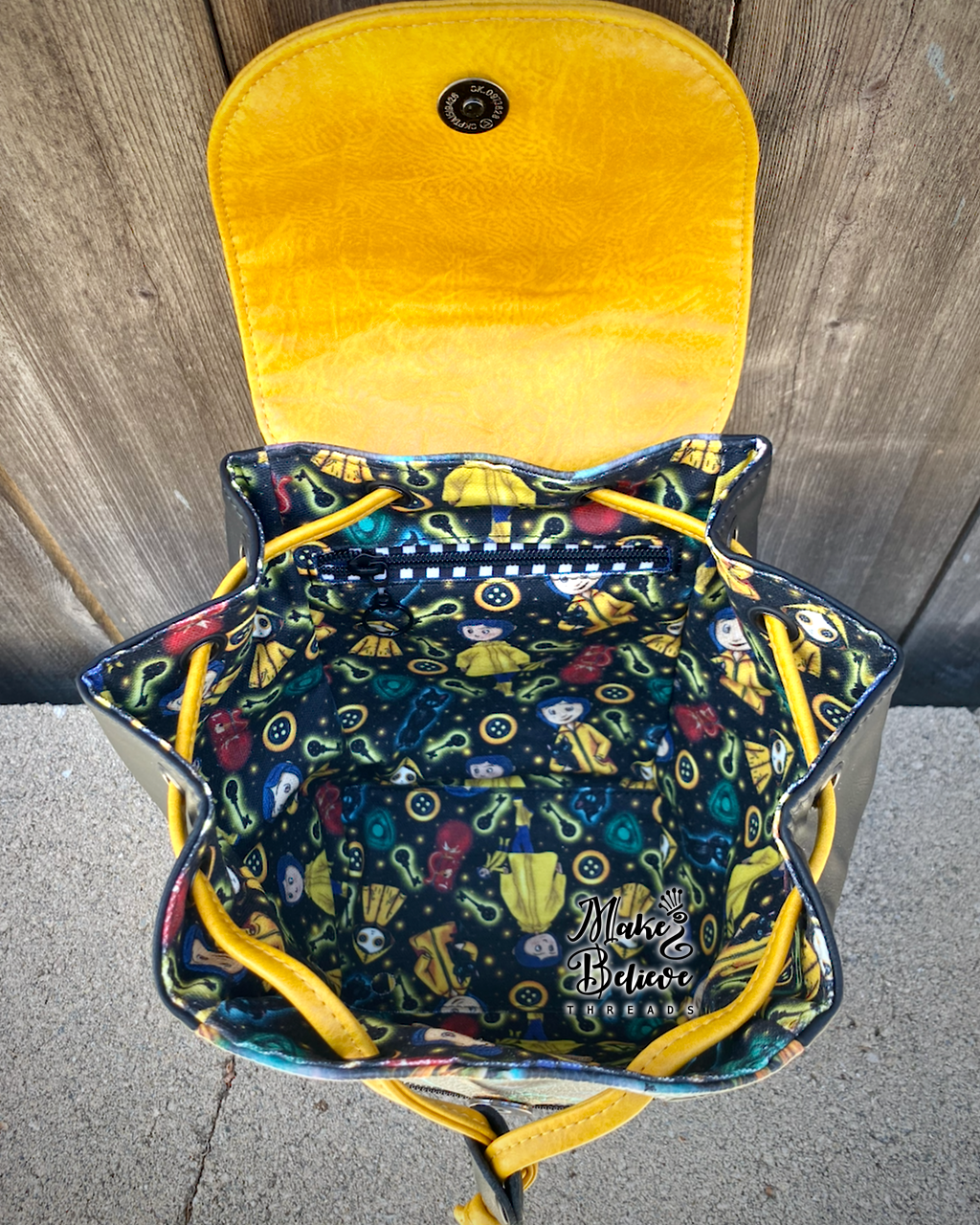 Otherworld Girl Mini Bucket Backpack with Flap