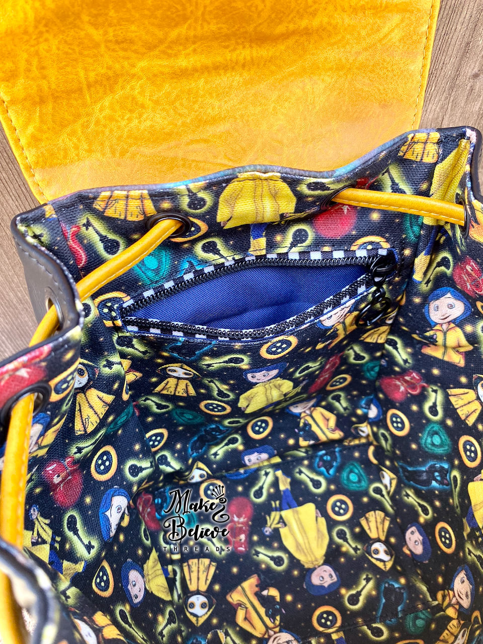 Otherworld Girl Mini Bucket Backpack with Flap