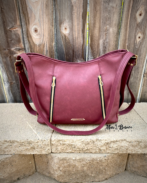 Sleek Bordeaux Convertible Bag with Gold Hardware