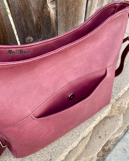 Sleek Bordeaux Convertible Bag with Gold Hardware