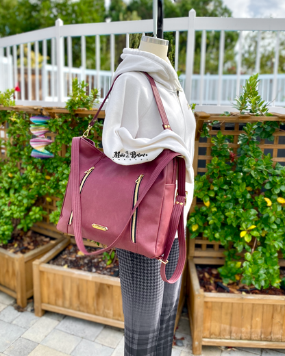Sleek Bordeaux Convertible Bag with Gold Hardware