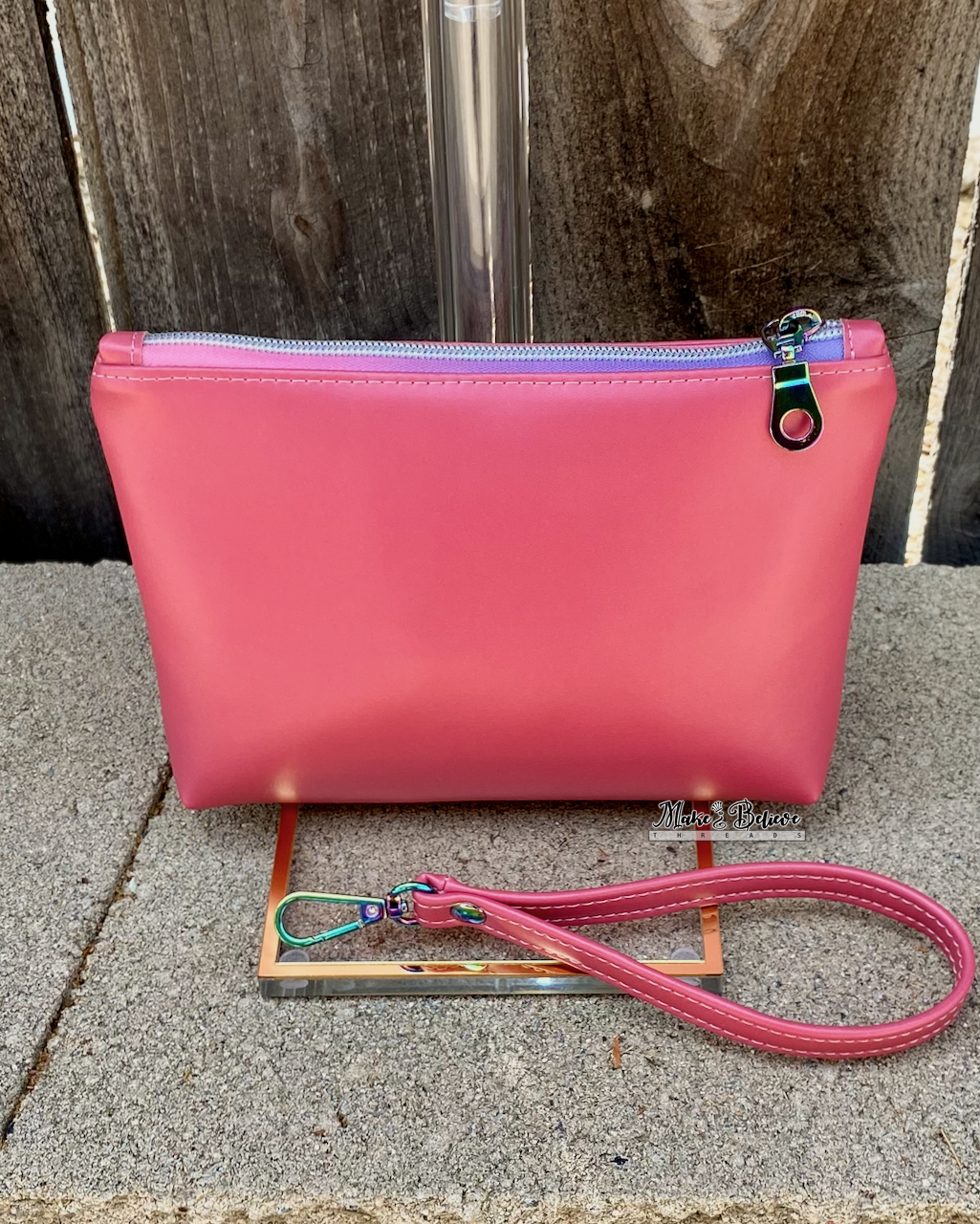 Squishimals Soft Shimmering Coral Pouch with Wristlet Strap