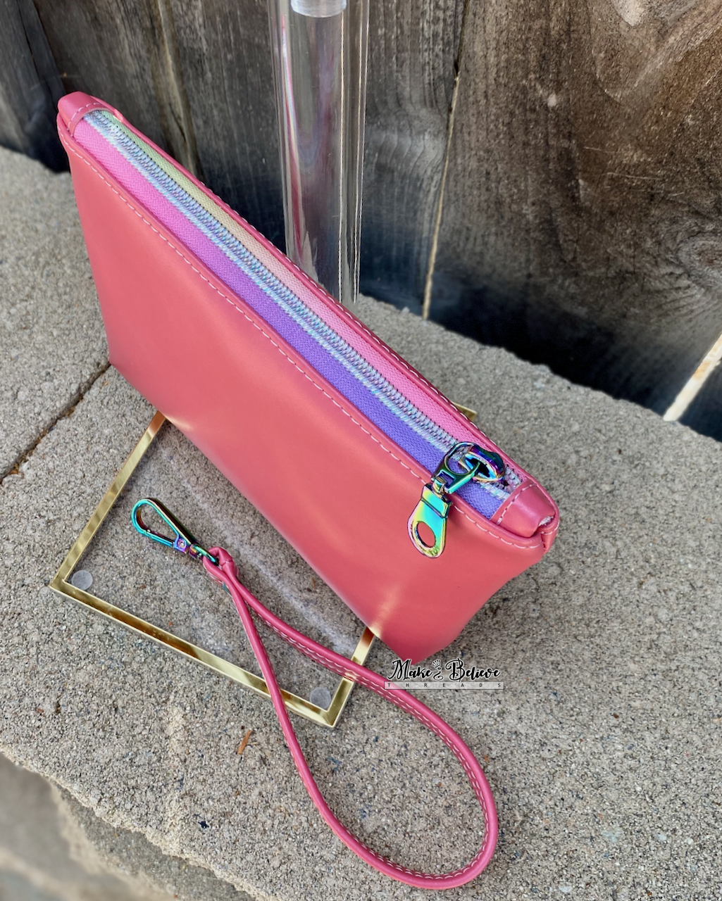 Squishimals Soft Shimmering Coral Pouch with Wristlet Strap