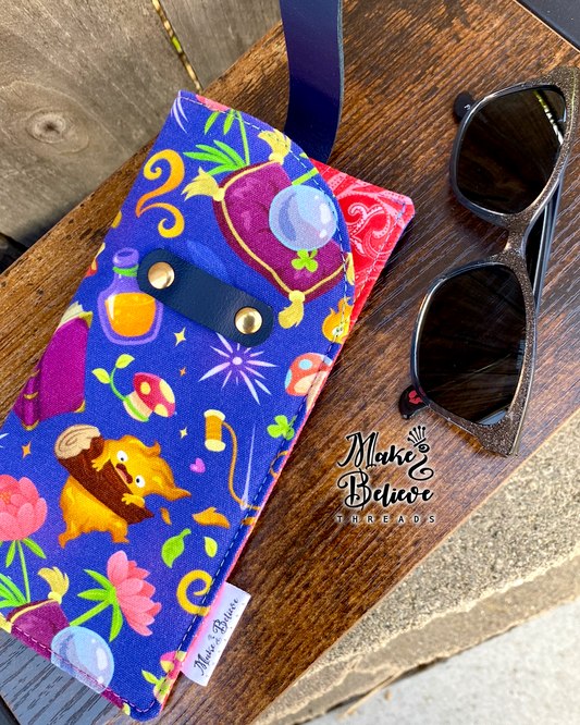 Studio G Icons on Blue Glasses Sleeve