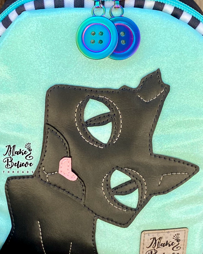 The Cat GITD Mint and Black Mini Crossbody Sling