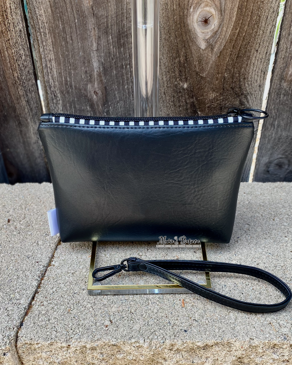 Wicked Cuties Black Pouch with Wristlet Strap